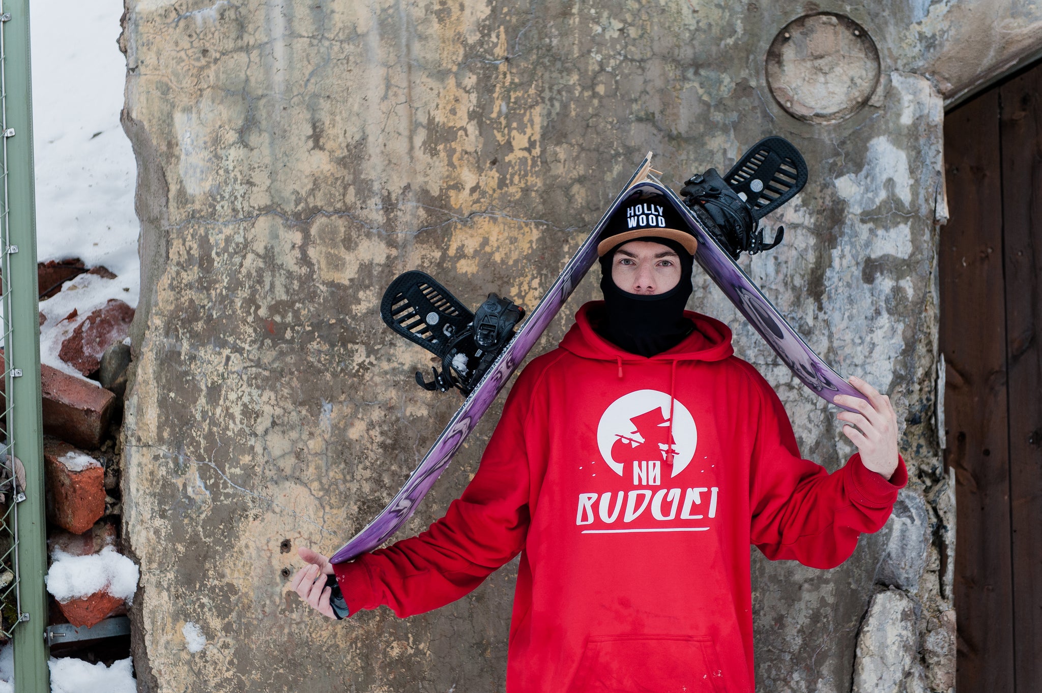 Lowe Andersson of No Budget Productions and Brand Ambassador for NYA-EVO carrying his broken board. Photo by Patrik Lofgren. 